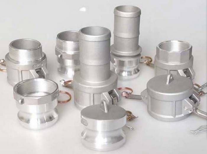 Eight different types and sizes aluminum camlock couplings on the gray background.